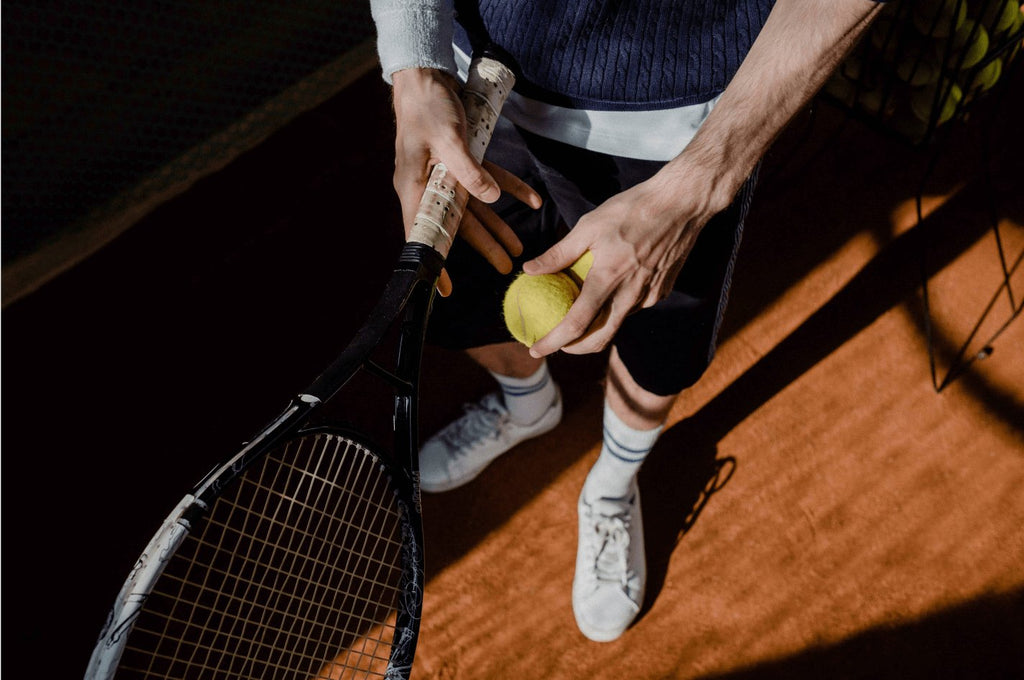 Why do Tennis Players Wear Arm Compression Sleeves? - Cambivo